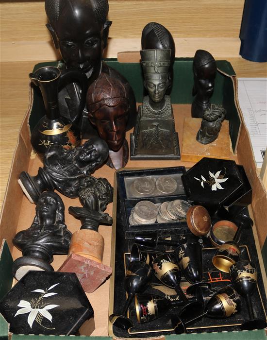 A bronze and marble classical helmet paperweight, assorted soft metal and hardwood busts and sundries